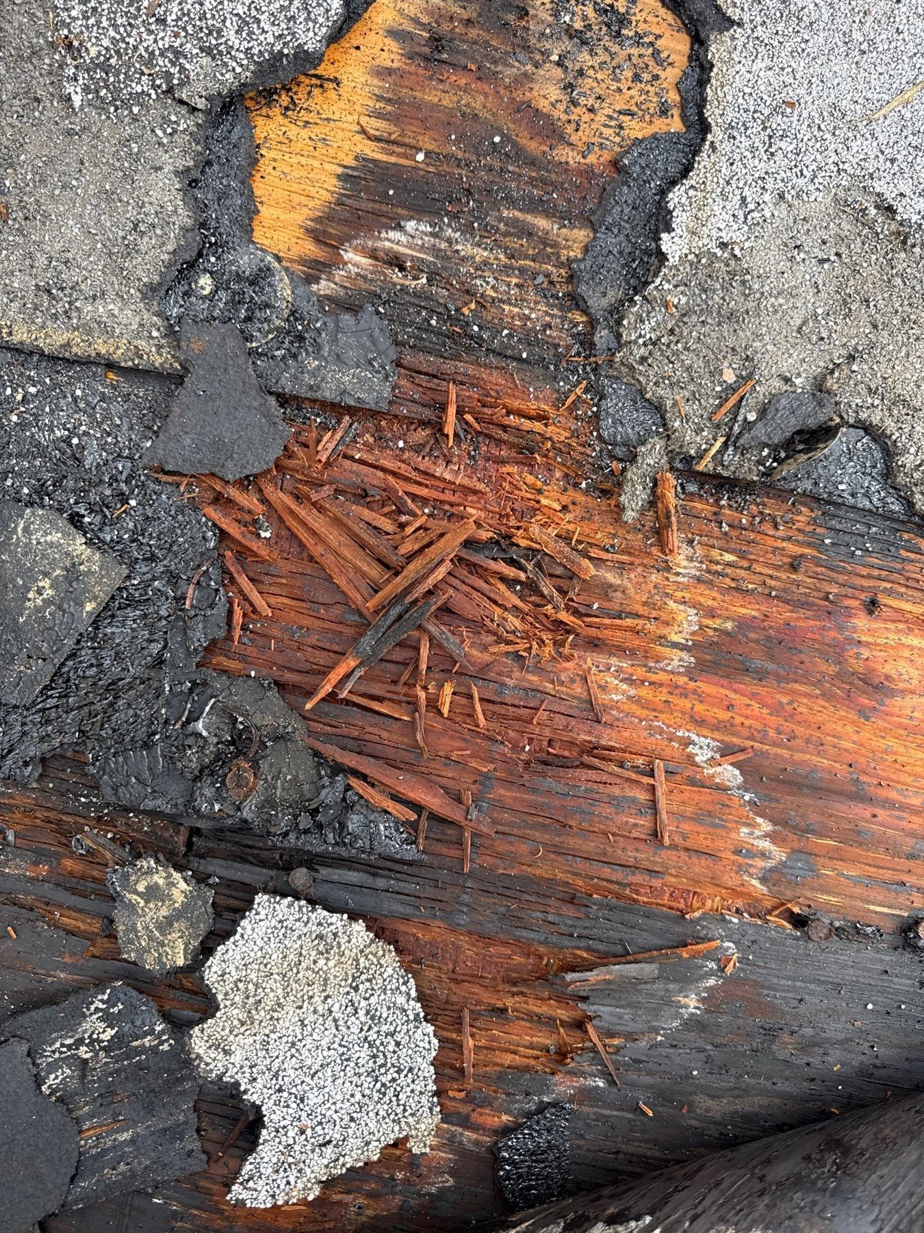 Deteriorated roof decking uncovered during a tile roof repair in Andros Isle