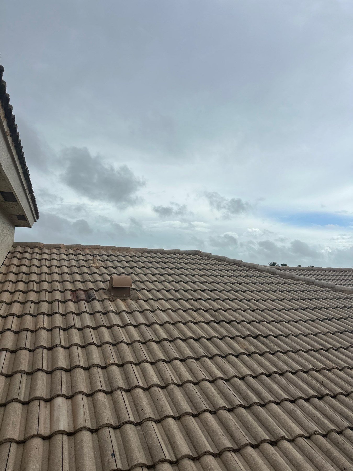 Completed tile roof repair area in Andros Isle