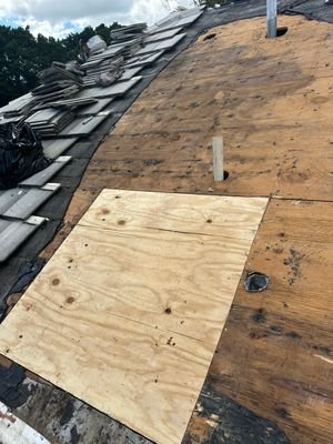 New plywood installed during a BallenIsles tile roof repair
