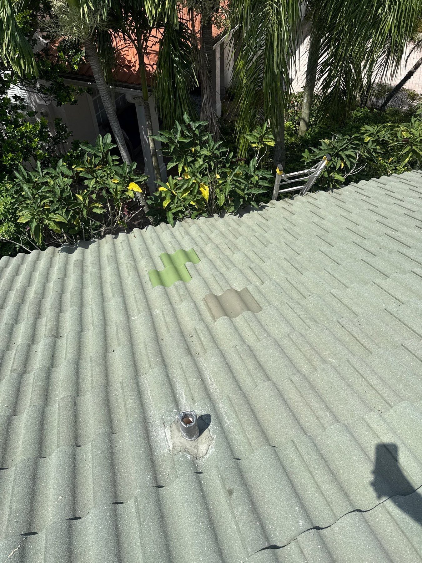 Completed tile roof repair area in Wellington, Florida