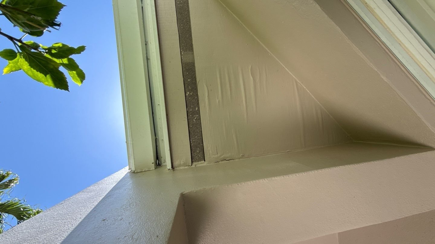 Water staining on a soffit below a leaking tile roof return in Palm Beach Gardens