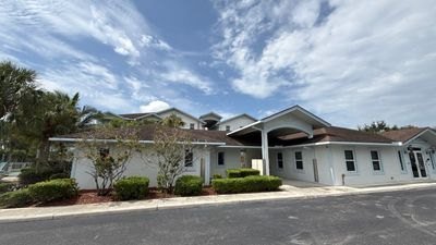 Wide view of a Roofs Done Right shingle roof repair project in Lake Worth