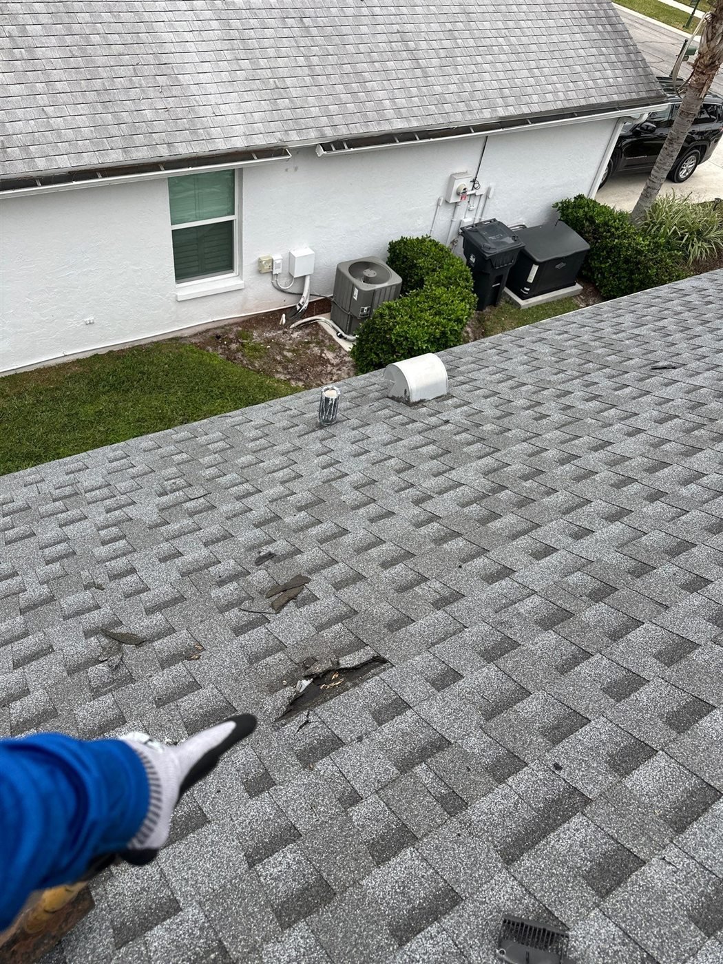 Existing shingle roof condition before replacement in Wellington Florida