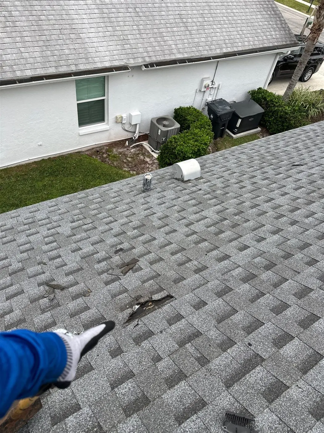 Existing shingle roof condition before replacement in Wellington Florida